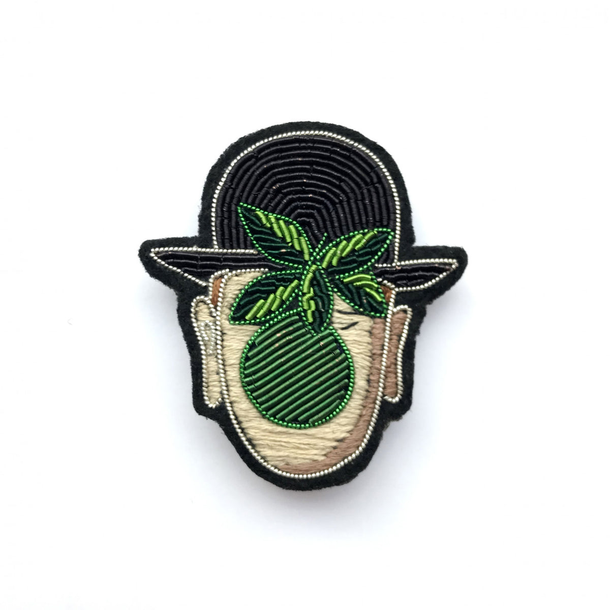 Broche Visage pomme brodée à la main - Collaboration The Magritte Shop